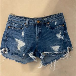 dark wash distressed shorts